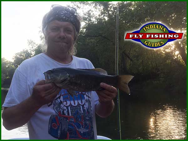Dr. Steve Mangas fly fishing the White River in Indiana